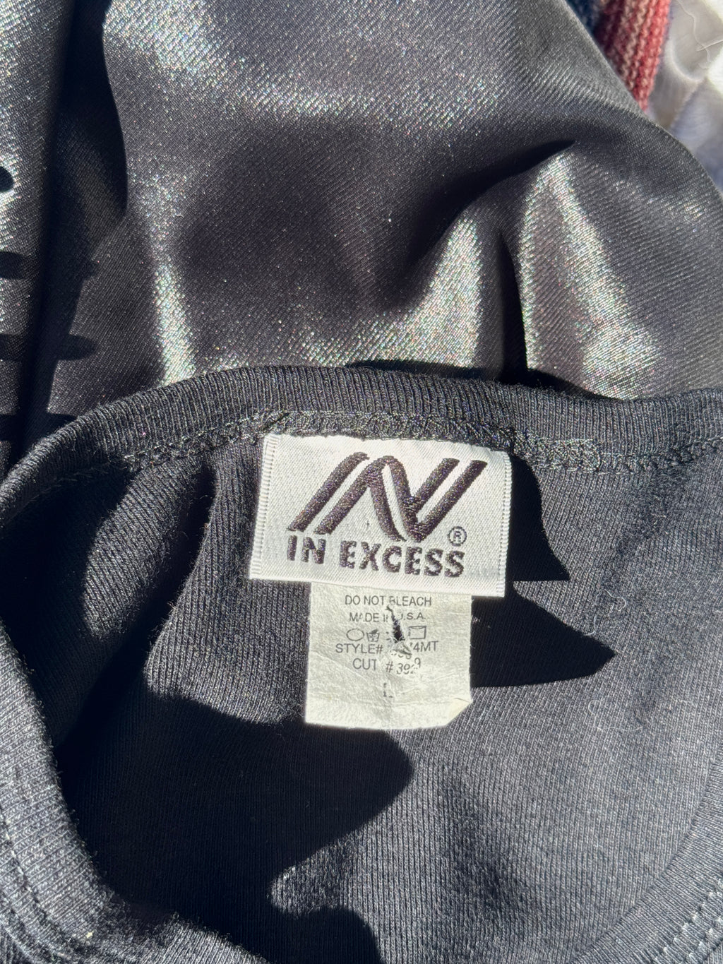 In Excess Tank Top
