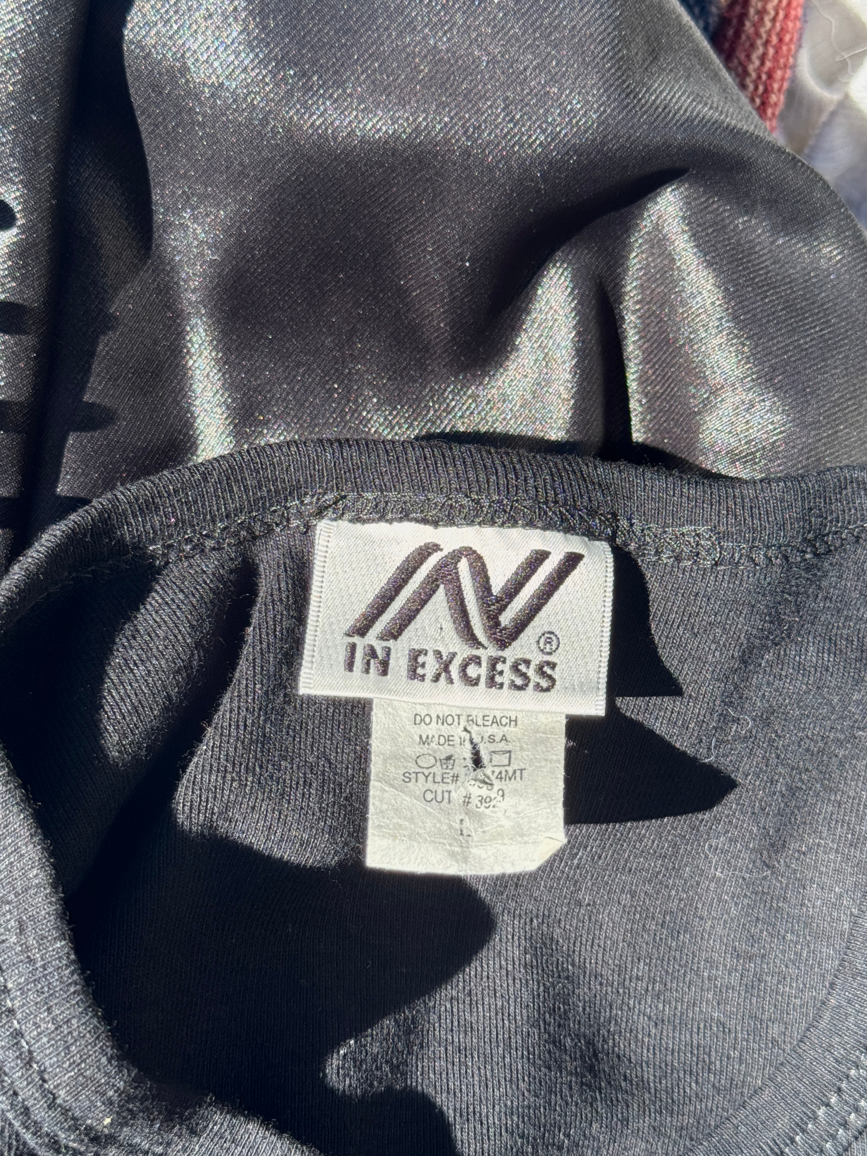 In Excess Tank Top
